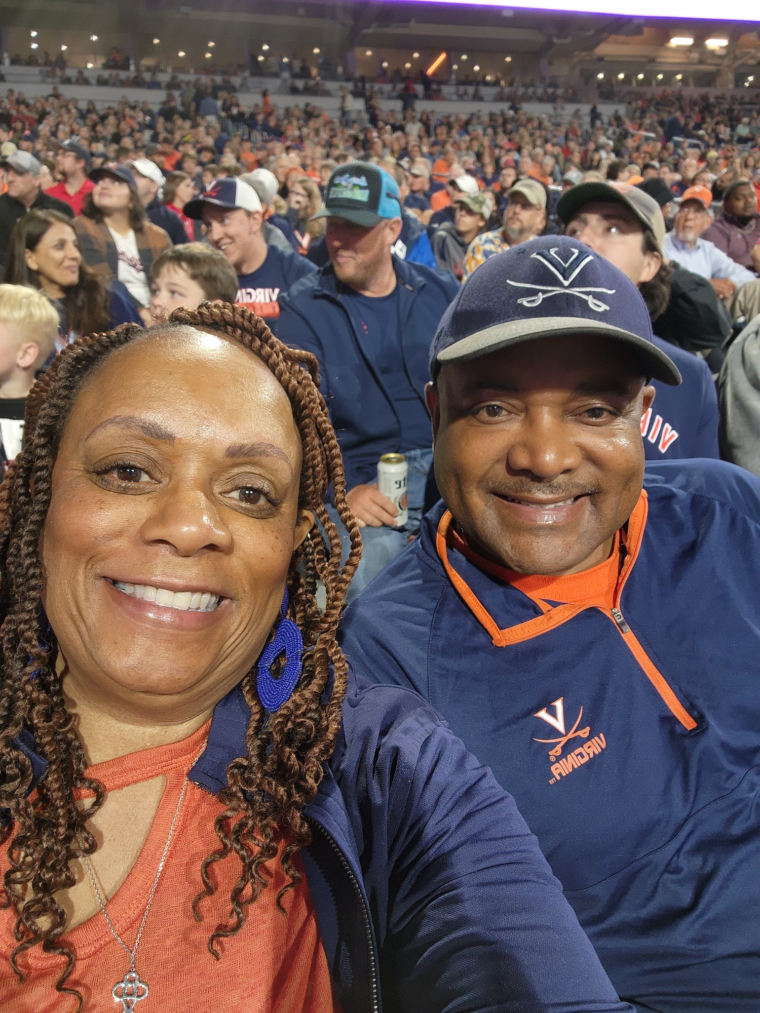 Mable and her husband at a UVA game