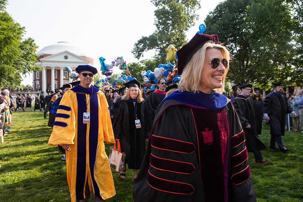 Dean Lubin leads the graduation walk in front of the UVA Rotunda