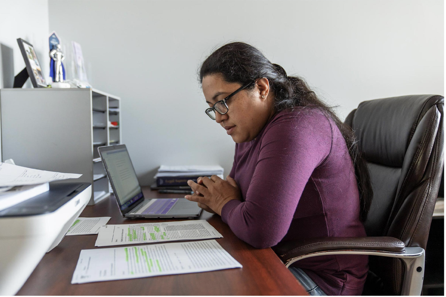 BIS student Claudia Edmonds studies at her desk