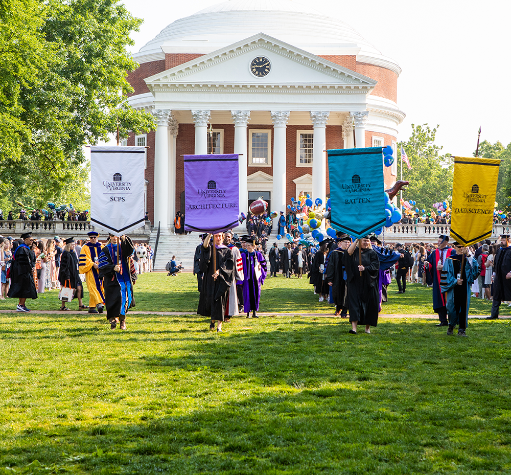 Graduates walking in front of the UVA rotunda