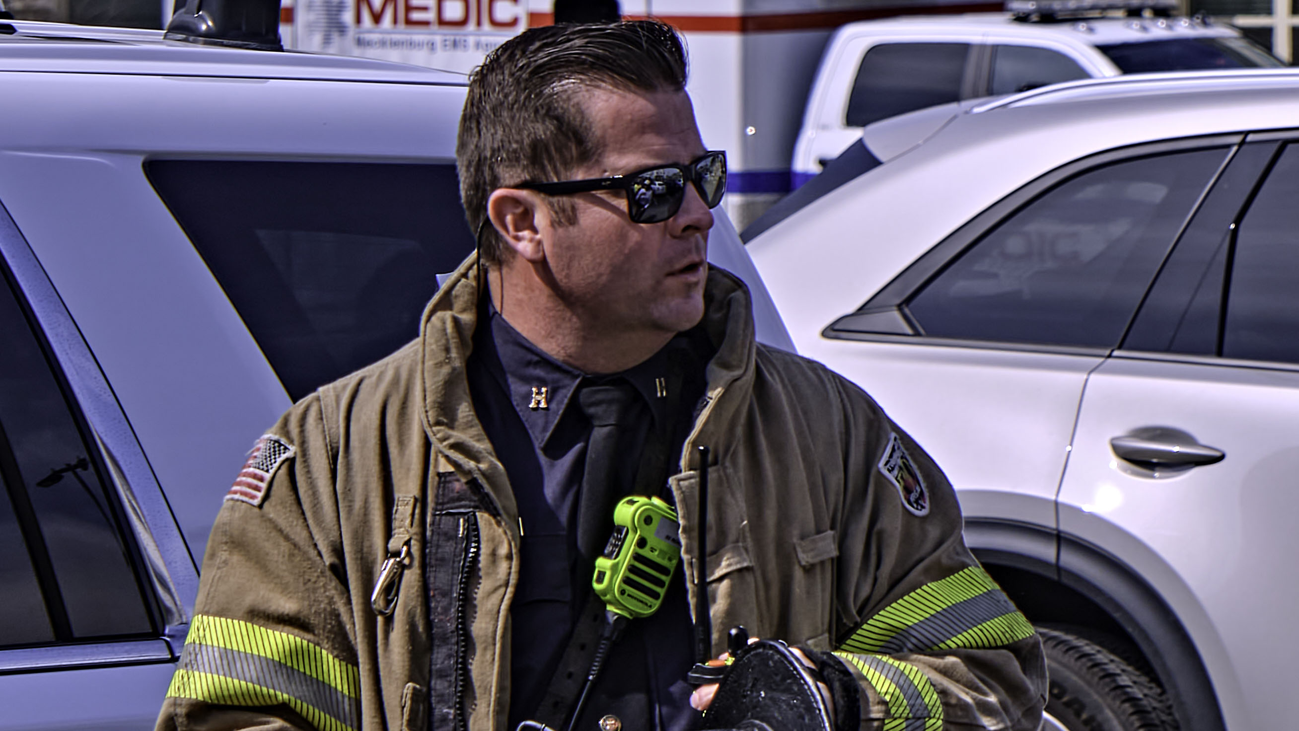 Captain Ryan Hutchison stands on duty