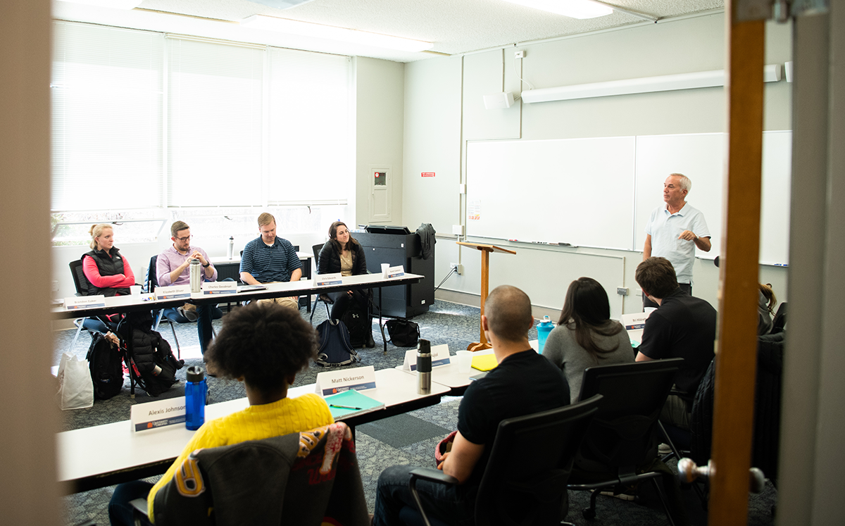 Dr. Powers connects with students in classroom