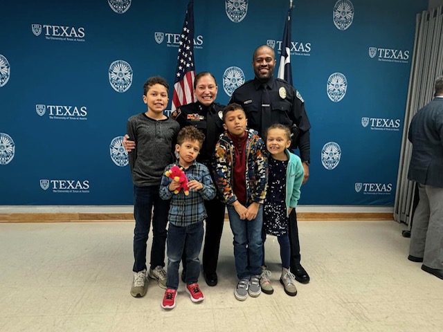 Ashley Griffin (second from left) stands with her husband and four children.