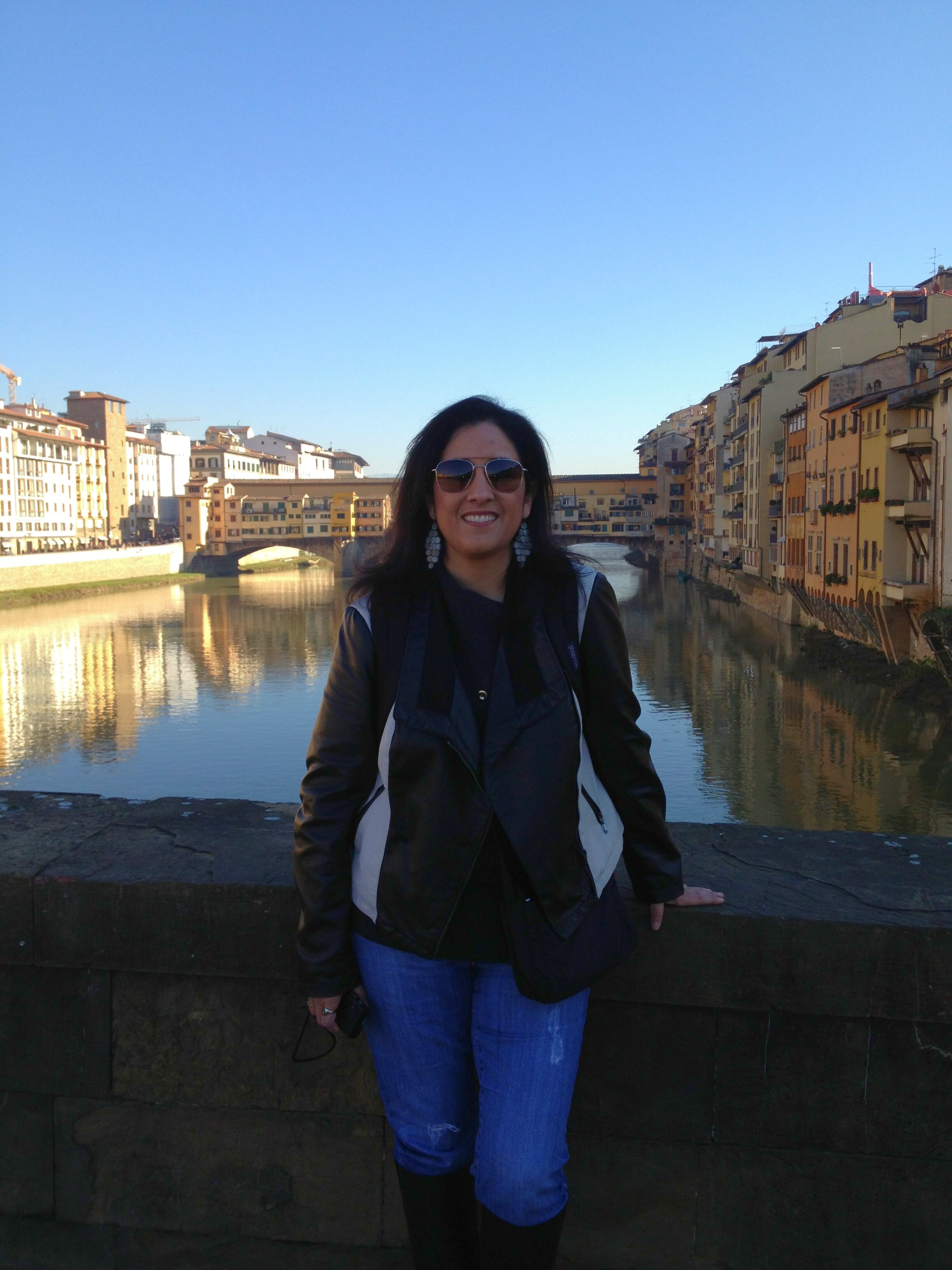 Tori Hobgood smiling on bridge in Florence