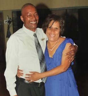 Starlette Fleming stands with her husband