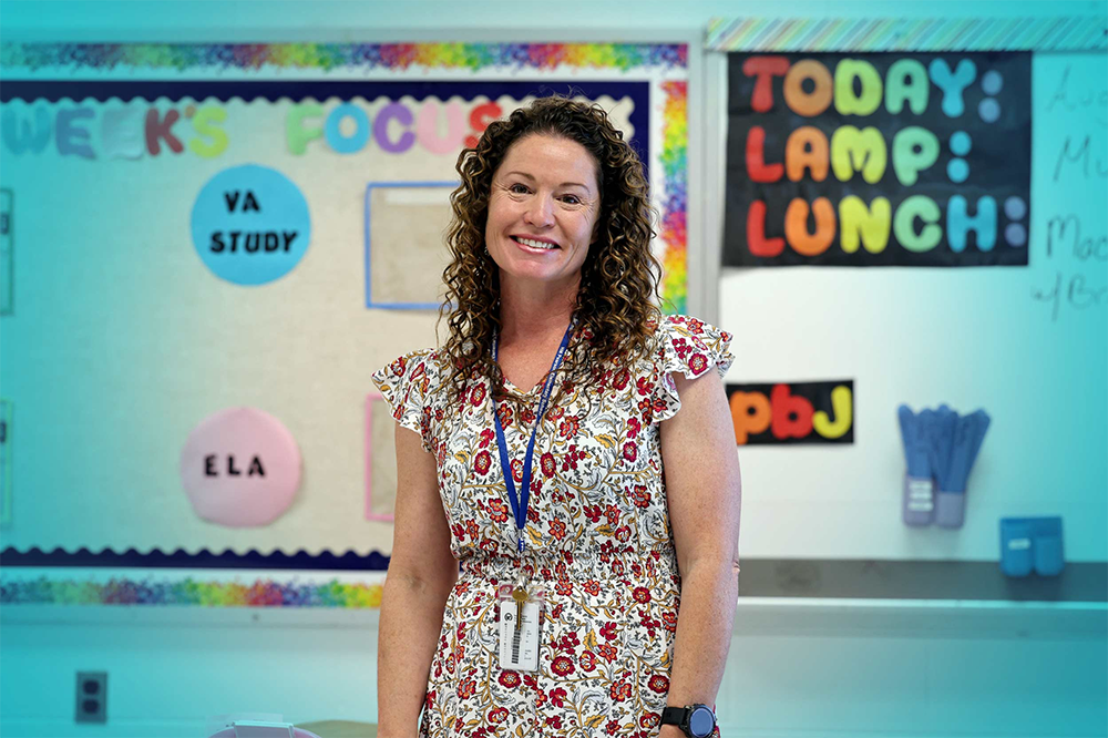 Anne Duckworth stands in her classroom