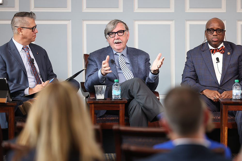 Gordon Graham and other panelists speak