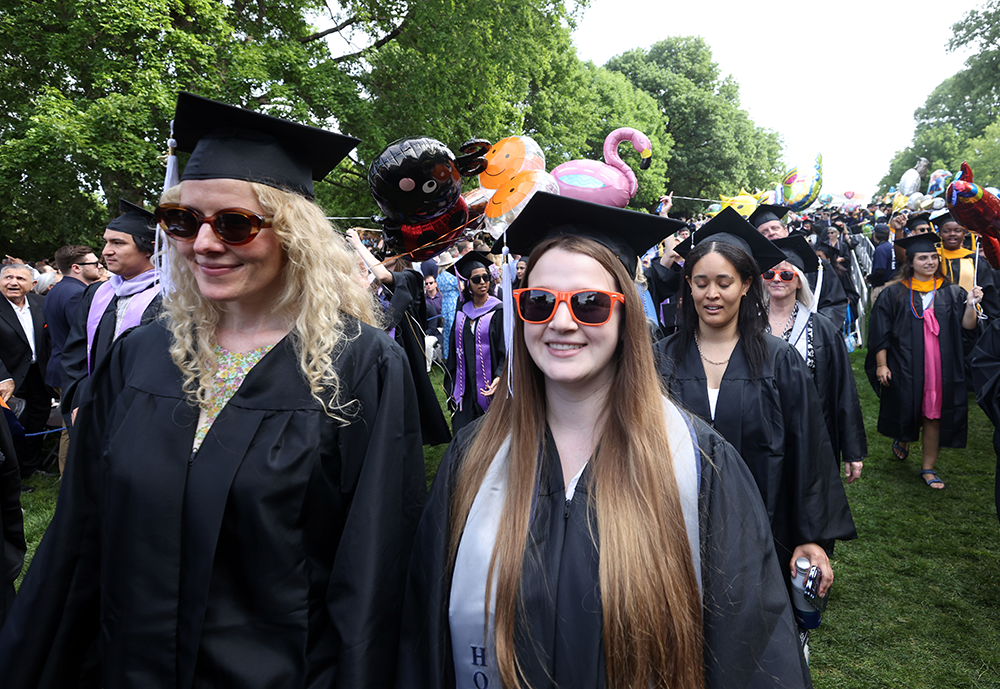 Juliette Yang walks the UVA lawn at graduation